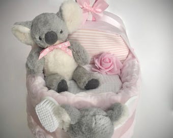 Nappy Pram with sumptuous soft pink swirl blanket with koala bear & matching rattle