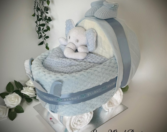 Nappy pram with elephant comforter, snuggly waffle blanket and  "its a boy" or "its a girl" detail
