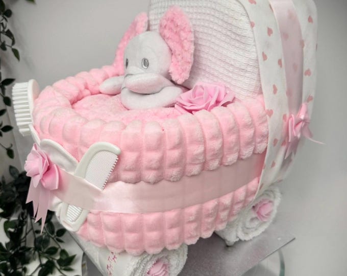 Pink Nappy Cake Pram with sumptuous soft blanket and comforter