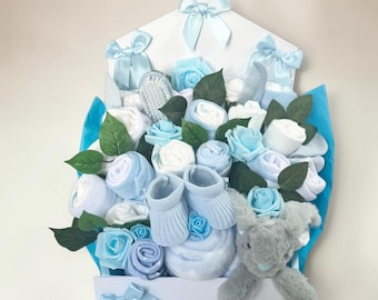 Baby clothes bouquet includes nappies, socks, comforter etc