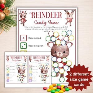 May include: A Christmas-themed game set with the text "REINDEER Candy Game". The game features a reindeer graphic and instructions for play, including "Place on red" and "Place on green". Includes two different size game cards.