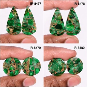 May include: Four pairs of gemstones in various shapes. Two pairs are teardrop-shaped, and two are round. The gemstones are a vibrant green with gold-colored matrix patterns. Each pair is held by a hand, with the product codes IR-8477, IR-8478, IR-8479, and IR-8480 visible.