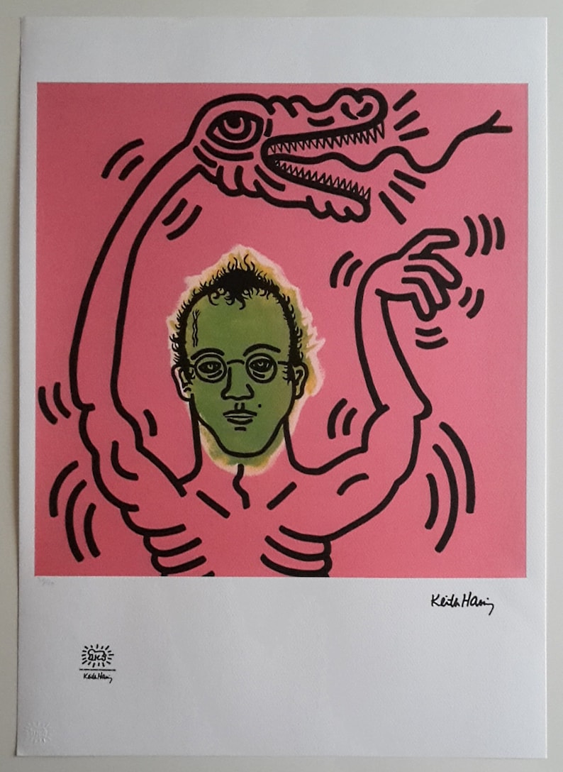 May include: A pink and black line art print of a man with green skin and glasses, with a black and white monster above him. The print is signed "Keith Haring".