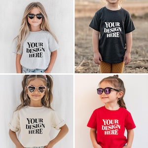 Showcase your designs with this premium Bella Canvas 3001T kids mockup bundle, featuring 18 high-resolution flat lay mockups in a wide range of colors. These mockups are perfect for designers, Etsy sellers, and print-on-demand (POD) businesses looking to professionally present their youth apparel designs. Each flat lay mockup displays the Bella Canvas 3001T toddler/youth tee in a clear, minimalistic overhead style, allowing your design to be the focus. These are JPG-only files.