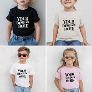 Showcase your designs with this premium Bella Canvas 3001T kids mockup bundle, featuring 18 high-resolution flat lay mockups in a wide range of colors. These mockups are perfect for designers, Etsy sellers, and print-on-demand (POD) businesses looking to professionally present their youth apparel designs. Each flat lay mockup displays the Bella Canvas 3001T toddler/youth tee in a clear, minimalistic overhead style, allowing your design to be the focus. These are JPG-only files.