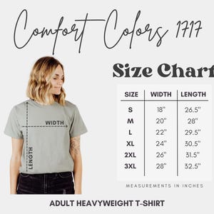 May include: Size chart for adult heavyweight t-shirts. The chart shows the width and length measurements in inches for sizes S, M, L, XL, 2XL, and 3XL.