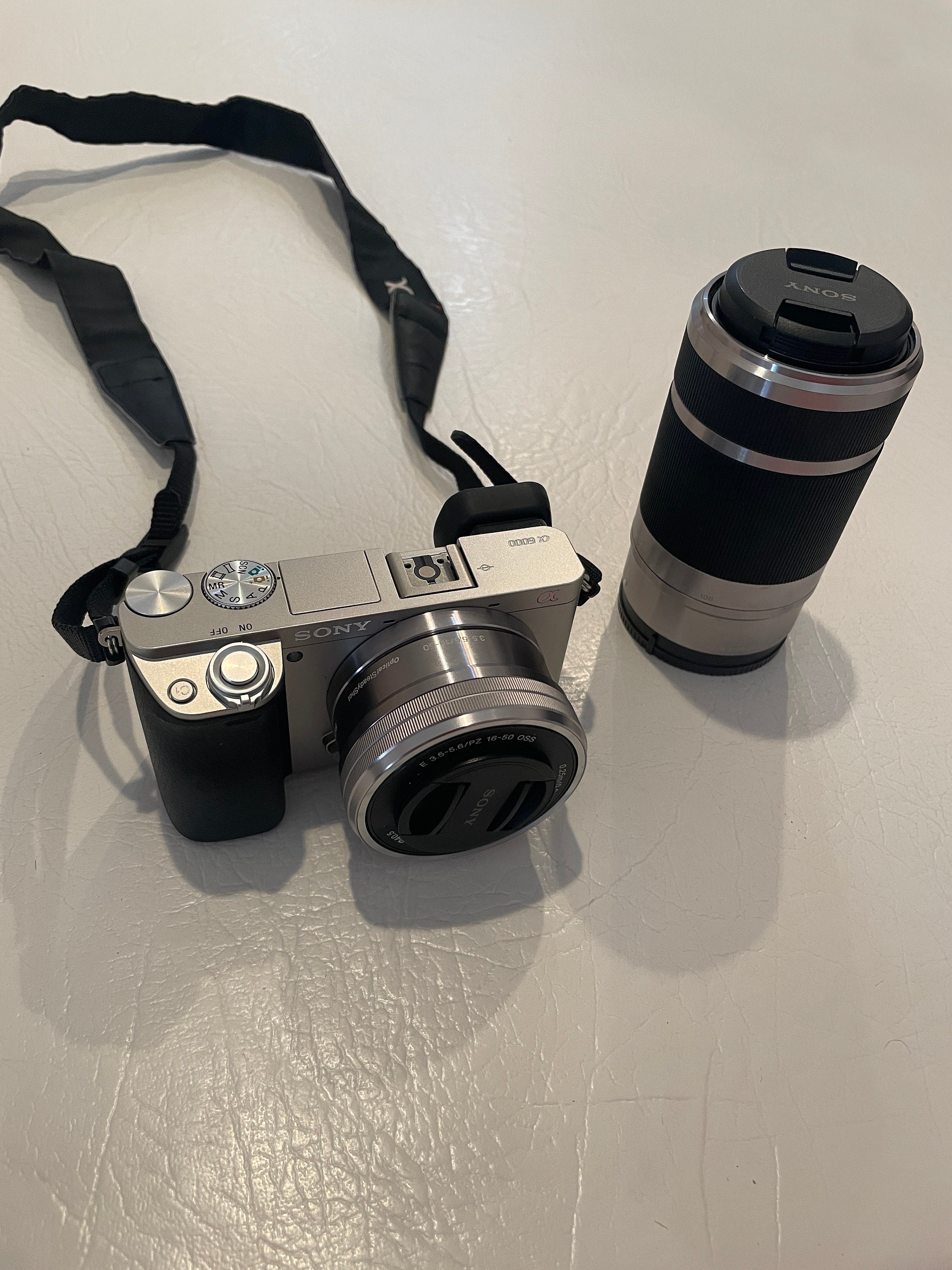 SONY A6000 Silver Camera With 16-50mm & 55-210mm, Comes With