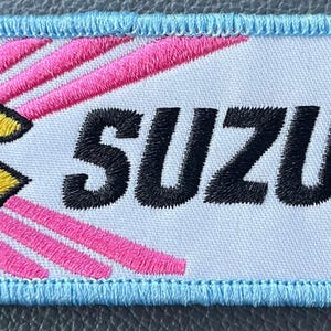 May include: A rustic wooden sign with the text "Welcome to our home" in white lettering. The sign features a distressed finish and a simple, inviting design, perfect for a front porch or entryway.