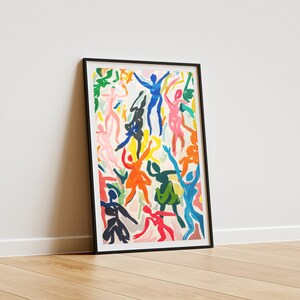 May include: A framed print of an abstract painting featuring colorful figures in various poses. The figures are painted in shades of blue, green, yellow, orange, pink, and red against a white background.