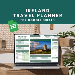 May include: A laptop computer displaying a Google Sheets spreadsheet titled "Ireland Trip Dashboard". The spreadsheet includes sections for trip details, traveler details, packing status, a to-do list, and a trip countdown. The background image shows a stone tower on a green hill with a cloudy sky.