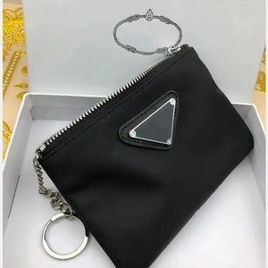KEY POUCH M62650 POCHETTE Wallet CLES Designer Fashion Womens Men Ring  Credit Card Holder Coin Purse Mini Bag Charm Accessories M62650 From  Grace_bags, $9.75