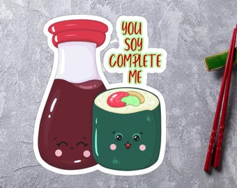 May include: A sticker with a cartoon soy sauce bottle and a sushi roll with the text "You soy complete me".