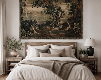 May include: A large rectangular wall tapestry featuring a detailed landscape scene with trees, birds, and a garden, hung above a wooden bed frame. The bed is dressed in white linens, a brown throw blanket, and several neutral-toned decorative pillows.