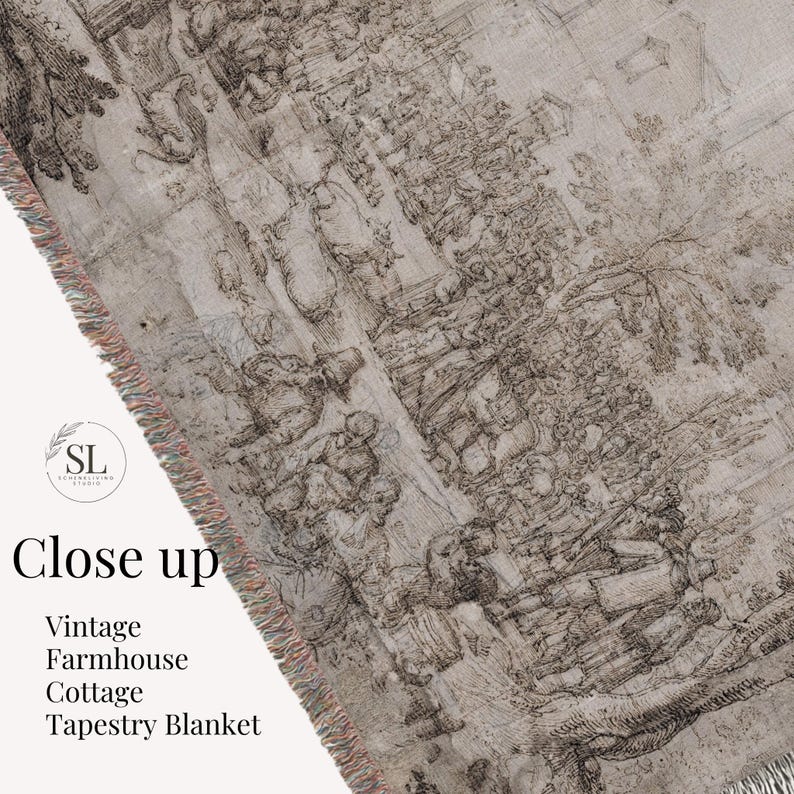 May include: A woven tapestry blanket featuring a detailed monochromatic brown and beige illustration of a historical village scene with figures, trees, and buildings. The blanket has a fringed edge and includes the text Close up Vintage Farmhouse Cottage Tapestry Blanket and the SL logo.
