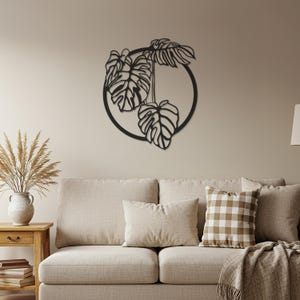 Metalowa dekoracja ścienna Monstera – minimalistyczna sylwetka tropikalnego liścia do salonu lub sypialni, nowoczesny wystrój botaniczny, akcent inspirowany naturą