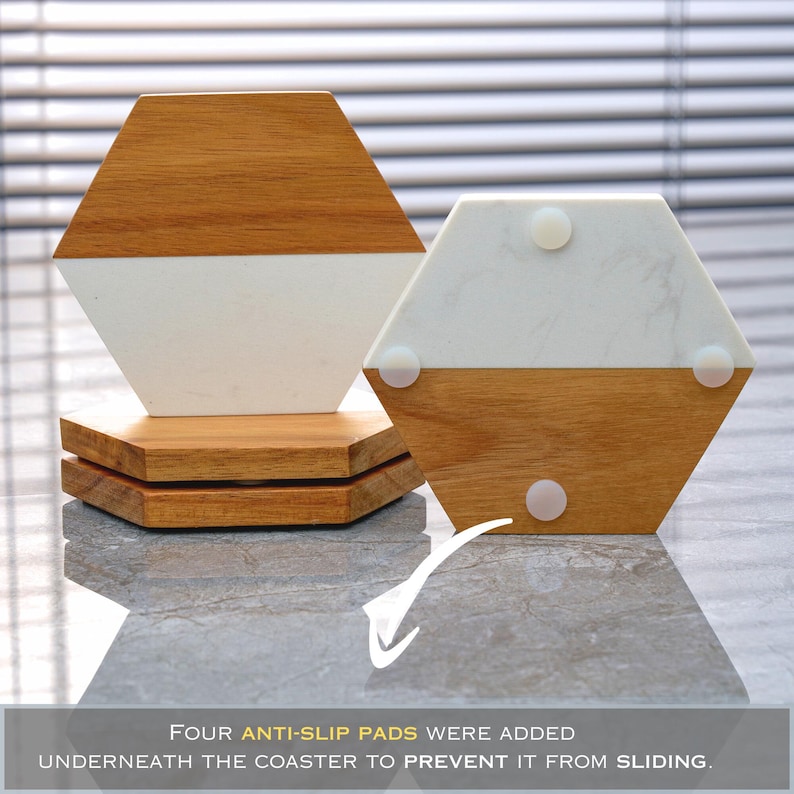 May include: Two hexagonal coasters made of wood and white marble. The coasters have four anti-slip pads on the bottom to prevent them from sliding.