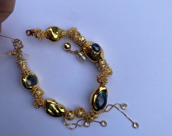 Pulsera de oro hecha a mano