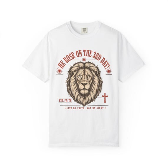Comfort Colors- "He Rose on the 3rd Day" Faith-Based Lion T-Shirt styled flat lay