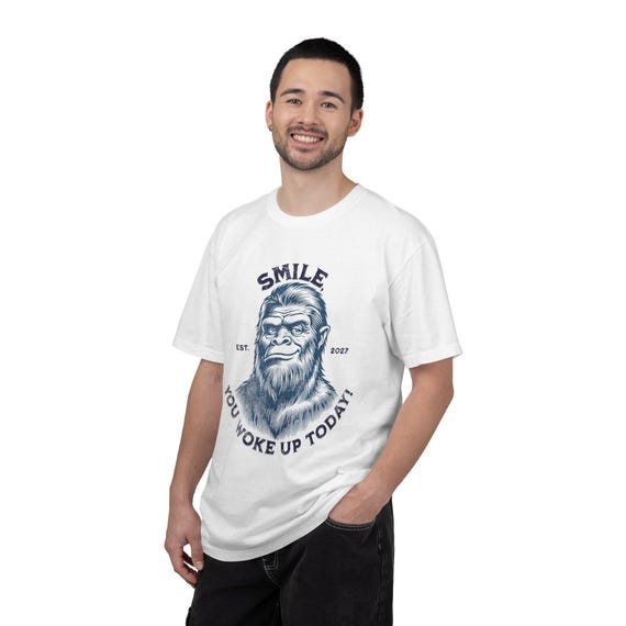 Smiling Sasquatch You Woke Up Today T-Shirt | Bigfoot Graphic Tee styled flat lay