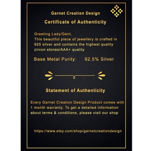 May include: A black rectangular certificate of authenticity from Garnet Creation Design with gold text and borders. It states the jewelry is crafted in 925 silver with AAA+ quality zircon stones, includes a 1-month warranty, and lists the shop URL.