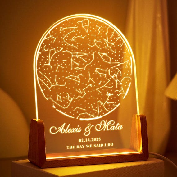 A custom star map night light on a real walnut base elevates the format into something you'd actually display — the warm wood + soft glow combo makes it feel genuinely handcrafted.