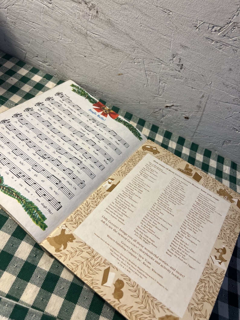 May include: A vintage children's book with a gold and brown cover featuring a bear and a squirrel. The back cover lists a variety of children's books with titles like "The Little Red Hen", "The Three Little Pigs", and "The Gingerbread Man".