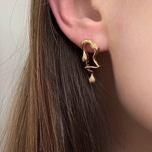 asymmetric earrings