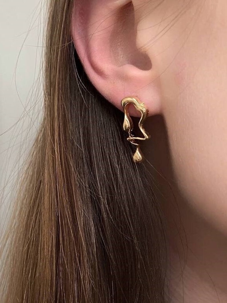 asymmetric earrings