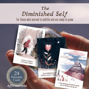 May include: A collection of three affirmation cards with illustrations and text, held in a hand. The cards feature images of a person in a pink coat, a flower, and a mountain scene. The text on the cards includes phrases like "I learned to disappear" and "My accomplishments were jealousy, not pride."