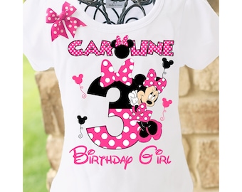 May include: White t-shirt with a pink and black polka dot design featuring Minnie Mouse, the number 3, and the text "Caroline Birthday Girl".