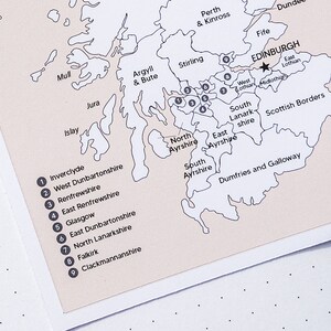 May include: A black and white map of Scotland with the names of the different regions labeled. The map is divided into 9 regions, each with a number and a name. The regions are Inverclyde, West Dunbartonshire, Renfrewshire, East Renfrewshire, Glasgow, East Dunbartonshire, North Lanarkshire, Falkirk, and Clackmannanshire.