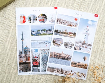 May include: Two travel-themed postcards featuring images of Turkey. One postcard is labeled "TURKEY 1" and the other "TURKEY 2". Each postcard has a Turkish flag and various photographs of landmarks and scenes from Turkey.