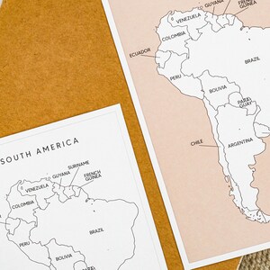 May include: A black and white outline map of South America with country names labeled. The map is on a light pink background.