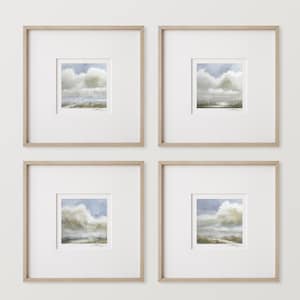 Puede incluir: Cuatro impresiones artísticas enmarcadas de paisajes. Cada impresión presenta una pintura de acuarela de un cielo nublado sobre un campo. Las pinturas son de formato cuadrado, enmarcadas en blanco y enmarcadas en madera clara.