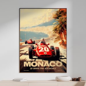 May include: Vintage style poster featuring a red racing car speeding down a winding road with a view of the city of Monaco in the background. The poster reads "Monaco 25th Grand Prix Automobile".