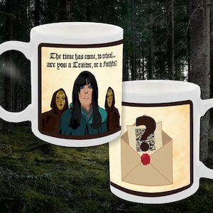 May include: Two white ceramic mugs with distinctive designs. One mug displays a woman with long black hair and two figures in brown cloaks, with the text "The time has come, to reveal... are you a Traitor, or a Faithful?" The other mug has a question mark and an envelope.