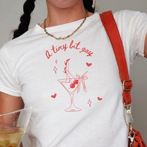 A Tini Bit Gay Lesbian Baby Tee Gay Coquette Shirt Sapphic Shirt Femme Lesbian Top Subtle Bi Pride Tee WLW Pride Shirt Queer Fashion