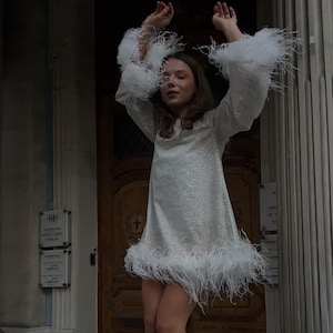 Glamorous Silver Glitter Dress with Ostrich Feather Details