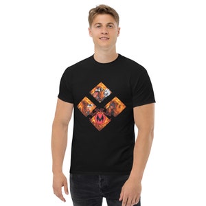 May include: Black t-shirt featuring a diamond-shaped design with cartoon characters set against a fiery background. The design includes the letters "LMP" and a stylized "M" in red. The shirt is made of a soft, comfortable material.