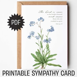 May include: A printable sympathy card featuring a watercolor illustration of blue forget-me-not flowers and green leaves. The card includes the text "The Lord is near to the broken hearted and saves those who are crushed in spirit" and "Psalm 34:18".