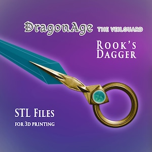 Puede incluir: Una daga dorada y turquesa con un mango en forma de anillo. La daga está etiquetada como "Dragon Age The Veilguard Rook's Dagger" y "STL Files for 3D Printing".