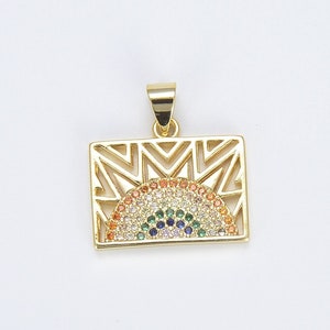 May include: Gold pendant with a rainbow design made of colorful gemstones set in a geometric frame.
