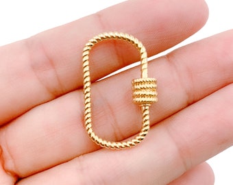 May include: Gold-toned metal lobster clasp with a twisted rope design. The clasp is oval-shaped and has a spring-loaded mechanism.