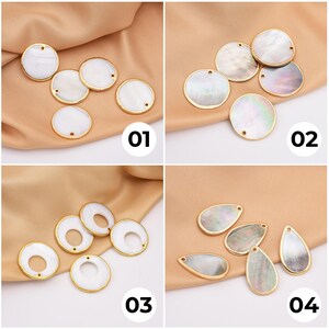 May include: Four sets of white and gold shell-shaped pendants. Each set features a different shape and size of shell pendant. The pendants are perfect for jewelry making or crafting.