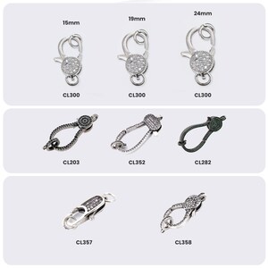 May include: A collection of silver-toned metal jewelry clasps featuring embedded clear stones. The set includes various shapes and sizes labeled CL300 at 15mm, 19mm, and 24mm, along with models CL203, CL352, CL282, CL357, and CL358, all displayed on a light background.