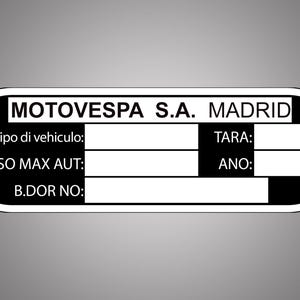 May include: Black and white metal tag with the text "MOTOVESPA S.A. MADRID" and spaces for information such as "Tipo di vehiculo", "PESO MAX AUT", "B.DOR NO", "TARA", and "ANO".