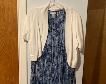 Blauwe blouse wit vest