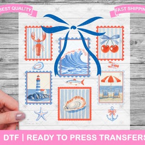May include: A nautical design with illustrations in postage stamp frames. Images include a lobster, cherries, a lighthouse, a seashell, a wave, a fish, a starfish, an anchor, and a beach scene. Blue ribbons and the text "DTF | READY TO PRESS TRANSFERS" complete the design.