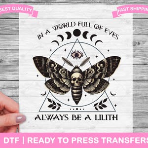 May include: A black and white moth with a skull design in the centre, surrounded by a triangle with a circle and an eye inside. The text "In a world full of Eves, Always be a Lilith" is written above and below the moth.