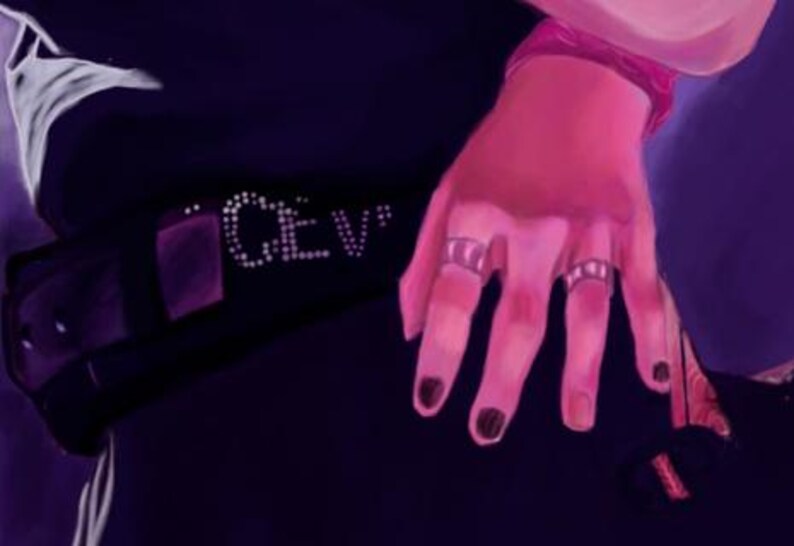 May include: A digital illustration of a hand with black nail polish and silver rings. The hand is wearing a pink wristband. The image also shows a black garment with the letters "CEV" in white.